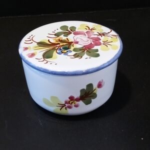 A small hand painted trinket box